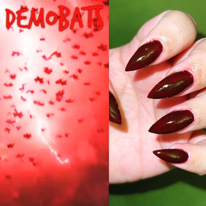 Radioactive Unicorn Demobats nail polish dark red burgundy manicure showing glossy shine and bold colour